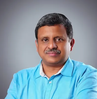 Dr. K. George Thomas